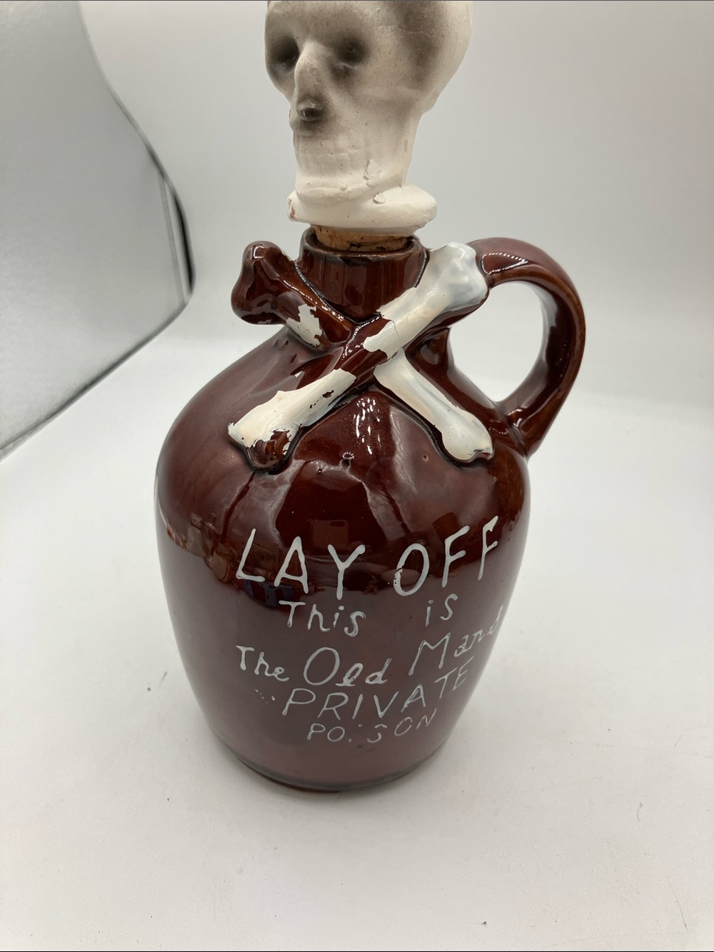 Vintage Style Brown Ceramic Decanter - with skull cork topper